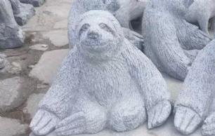 Dovendyr gråsort granit