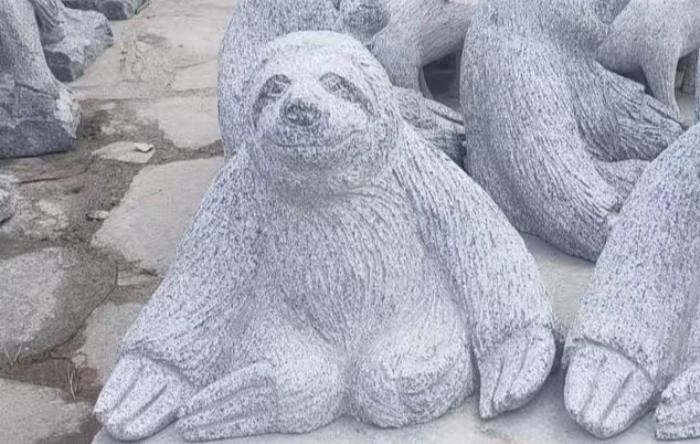 salg af Dovendyr gråsort granit