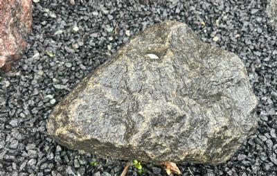 salg af Vandsten klippestykke